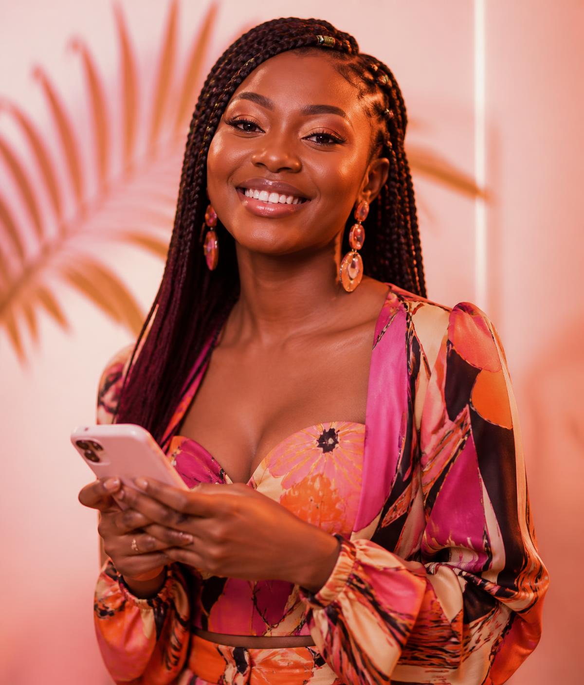 A young African woman smiling with confidence